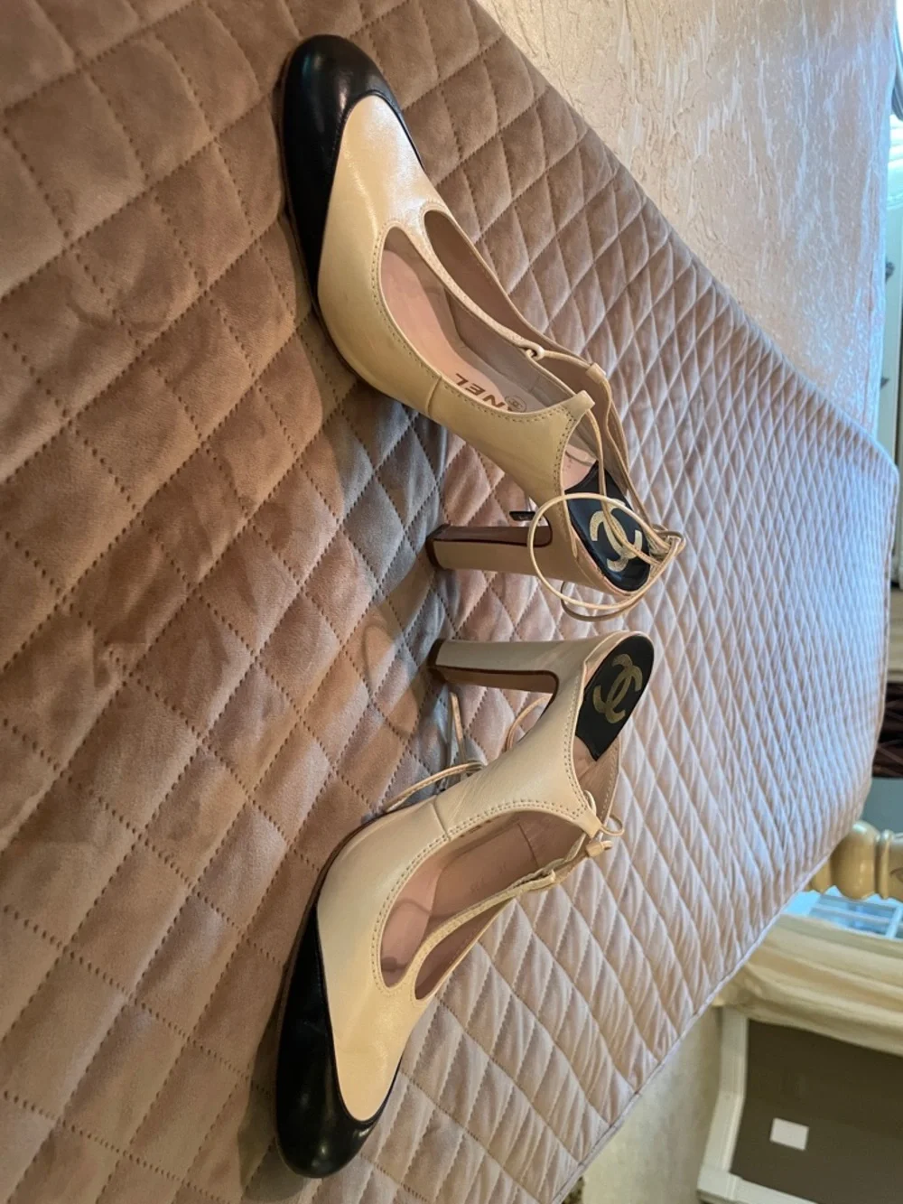CHANEL Two-Tone T-Strap Pumps in Cream and Black with Logo Heel